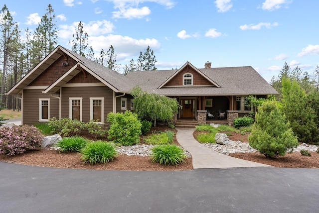 1122 E Hangman Ln, Spokane, WA 99224 - craftsman-style house with a chimney, a porch, and a shingled roof