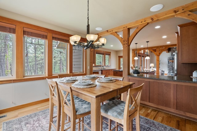 1122 E Hangman Ln, Spokane, WA 99224 - dining space featuring a chandelier, recessed lighting, and wood finished floors