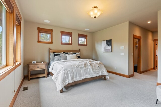 1122 E Hangman Ln, Spokane, WA 99224 - bedroom with light colored carpet, baseboards, and recessed lighting