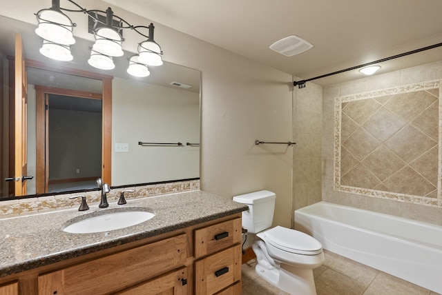 1122 E Hangman Ln, Spokane, WA 99224 - bathroom with vanity, toilet, bathtub / shower combination, and tile patterned flooring
