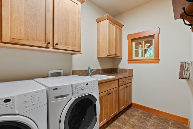 1122 E Hangman Ln, Spokane, WA 99224 - laundry area with separate washer and dryer, cabinet space, and baseboards