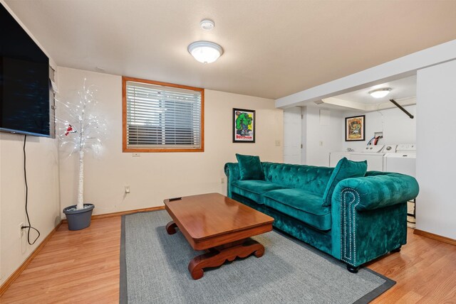 3507 E 28th Ave, Spokane, WA 99223 - living area with independent washer and dryer, wood finished floors, and baseboards