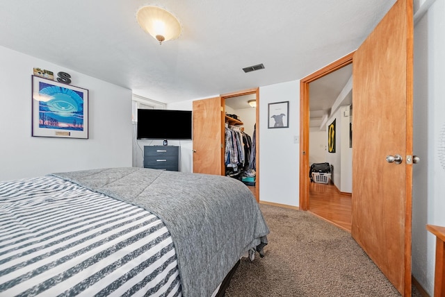3507 E 28th Ave, Spokane, WA 99223 - carpeted bedroom with a walk in closet and a closet