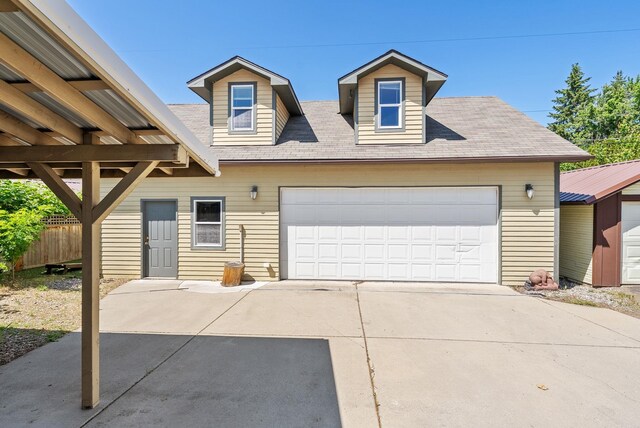 3507 E 28th Ave, Spokane, WA 99223 - view of front of home with driveway, roof with shingles, and an attached garage