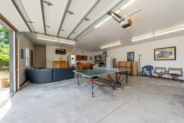 3507 E 28th Ave, Spokane, WA 99223 - garage featuring freestanding refrigerator and a garage door opener
