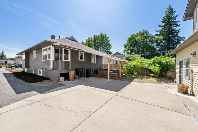 3507 E 28th Ave, Spokane, WA 99223 - rear view of house with a patio area and driveway
