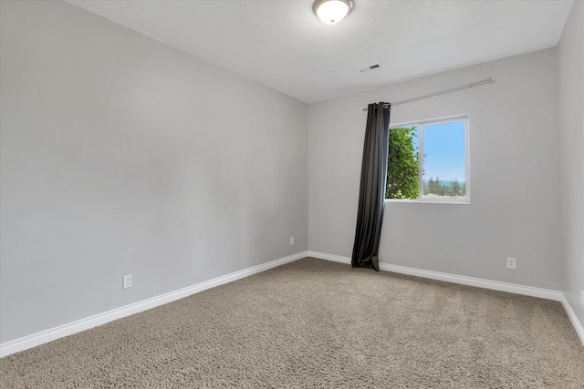 903 E Harding Ct, Spokane, WA 99218 - carpeted empty room featuring baseboards