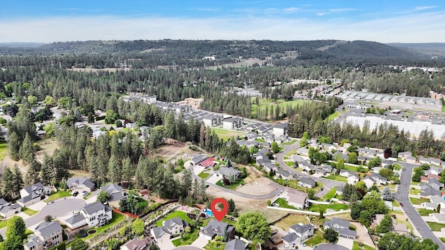 903 E Harding Ct, Spokane, WA 99218 - aerial view of property and surrounding area with a heavily wooded area and nearby suburban area