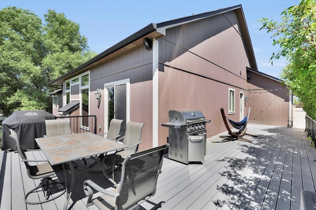 903 E Harding Ct, Spokane, WA 99218 - wooden deck with grilling area and outdoor dining space