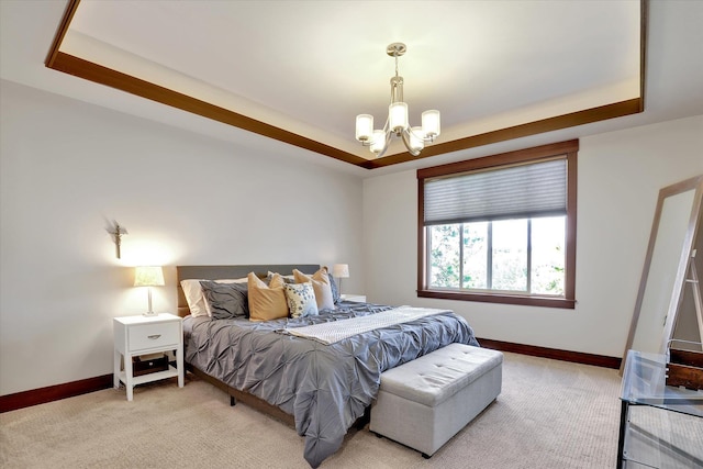 4523 S Henrys Fork Ln, Spokane, WA 99206 - bedroom with a raised ceiling, a chandelier, and light carpet
