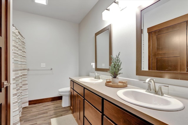 4523 S Henrys Fork Ln, Spokane, WA 99206 - bathroom with double vanity and wood finished floors