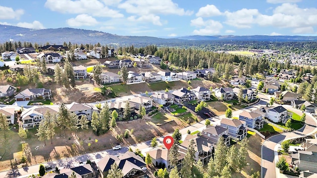 4523 S Henrys Fork Ln, Spokane, WA 99206 - aerial view of property's location featuring nearby suburban area and mountains