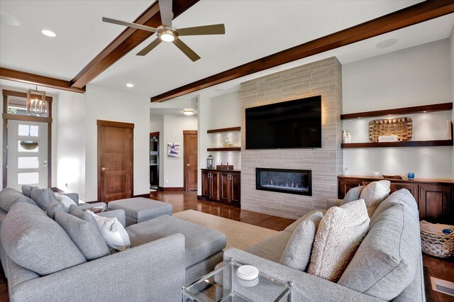 4523 S Henrys Fork Ln, Spokane, WA 99206 - living room with beamed ceiling, ceiling fan, wood finished floors, a large fireplace, and recessed lighting