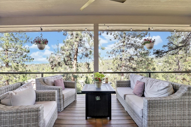 4523 S Henrys Fork Ln, Spokane, WA 99206 - deck featuring an outdoor living space and ceiling fan