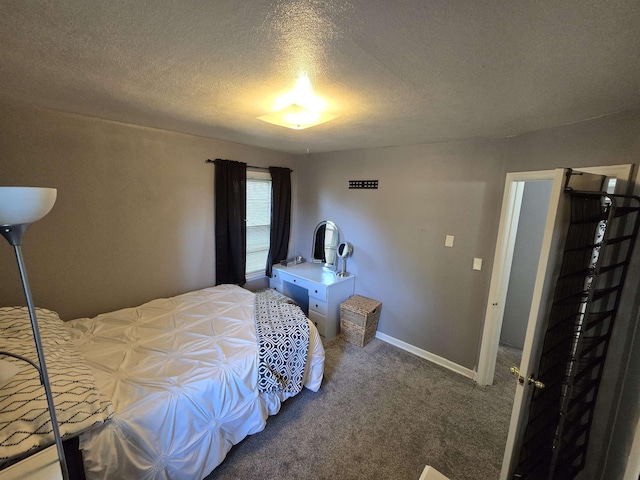 1117 E Garland Ave, Spokane, WA 99207 - carpeted bedroom with a textured ceiling and baseboards