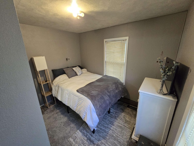 1117 E Garland Ave, Spokane, WA 99207 - carpeted bedroom featuring a textured ceiling