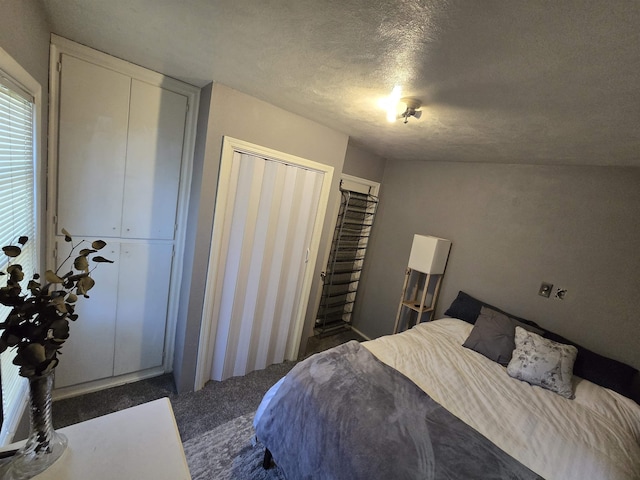 1117 E Garland Ave, Spokane, WA 99207 - carpeted bedroom with a textured ceiling