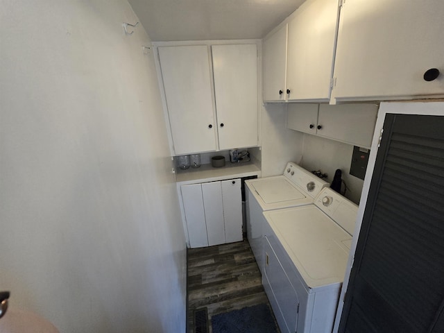 1117 E Garland Ave, Spokane, WA 99207 - washroom with cabinet space, separate washer and dryer, and dark wood-style flooring