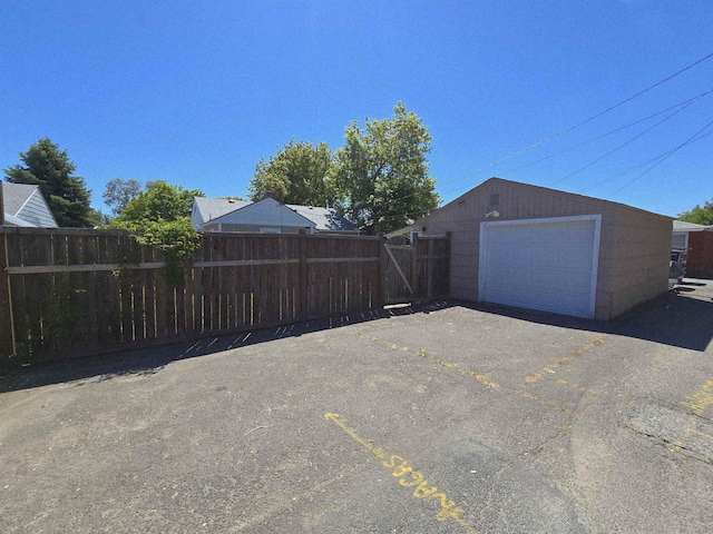 1117 E Garland Ave, Spokane, WA 99207 - detached garage featuring driveway