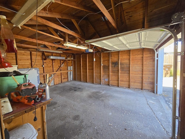 1117 E Garland Ave, Spokane, WA 99207 - garage featuring a garage door opener