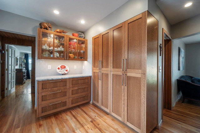 934 E 38th Ave, Spokane, WA 99203 - bar with light wood-type flooring, decorative backsplash, and recessed lighting