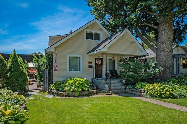 934 E 38th Ave, Spokane, WA 99203 - view of front of property featuring a front lawn and covered porch