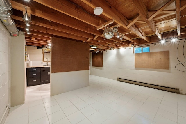 934 E 38th Ave, Spokane, WA 99203 - below grade area with baseboard heating and concrete block wall