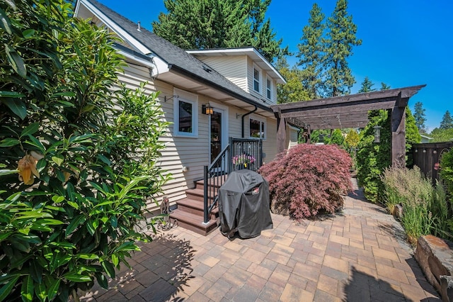 934 E 38th Ave, Spokane, WA 99203 - view of patio featuring area for grilling and a pergola