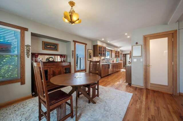 934 E 38th Ave, Spokane, WA 99203 - dining space with light wood-type flooring, recessed lighting, and a chandelier
