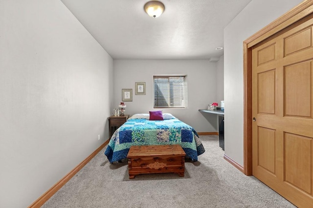 1220 E Fireside Ln, Spokane, WA 99208 - bedroom with light carpet and baseboards