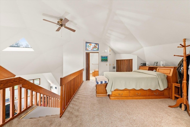 1470 State Route 174th Rte, Grand Coulee, WA 99133 - bedroom with lofted ceiling, light carpet, a ceiling fan, and a skylight