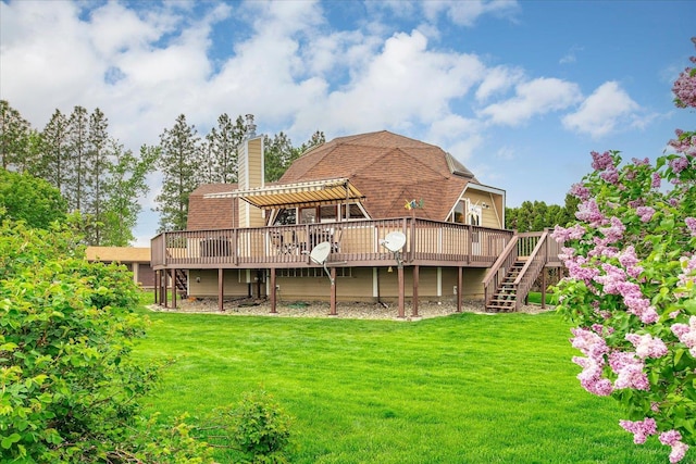 1470 State Route 174th Rte, Grand Coulee, WA 99133 - rear view of property with a wooden deck, a lawn, a chimney, and stairway