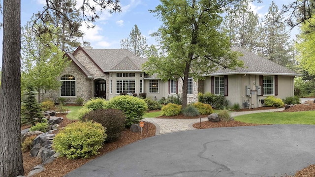 13411 S Bluegrouse Ln, Spokane, WA 99224 - view of front of house with stone siding and stucco siding