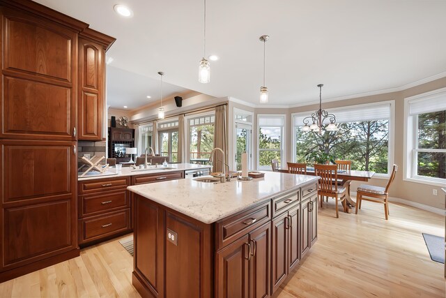 13411 S Bluegrouse Ln, Spokane, WA 99224 - kitchen featuring a sink, light wood-type flooring, plenty of natural light, crown molding, and recessed lighting