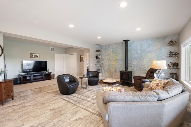13411 S Bluegrouse Ln, Spokane, WA 99224 - living area with a wood stove and recessed lighting
