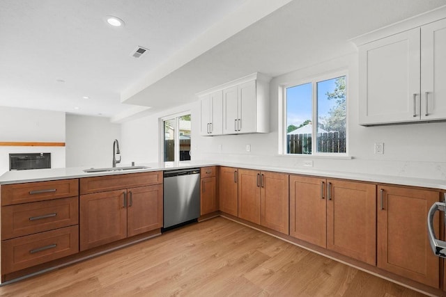 101 S W St, Chewelah, WA 99109 - kitchen with dishwasher, a sink, light countertops, plenty of natural light, and recessed lighting