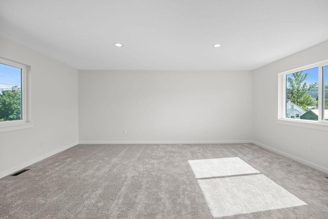 101 S W St, Chewelah, WA 99109 - empty room featuring carpet floors, recessed lighting, and baseboards