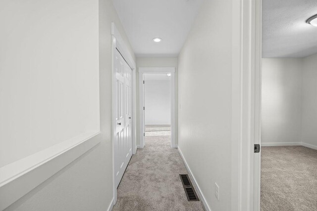 101 S W St, Chewelah, WA 99109 - hallway featuring carpet, baseboards, and recessed lighting