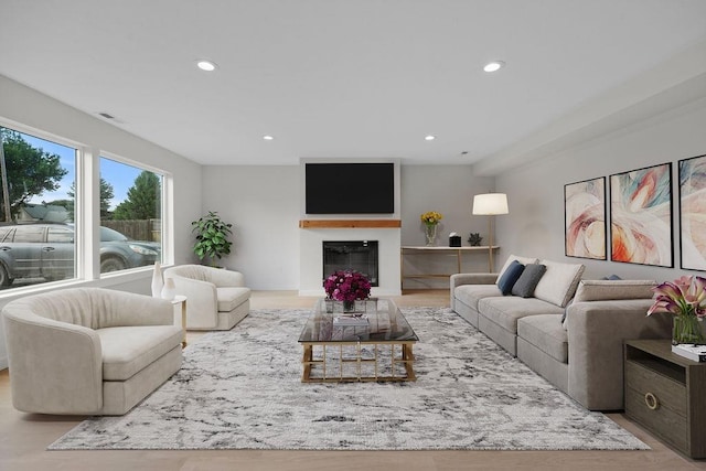 101 S W St, Chewelah, WA 99109 - living area with recessed lighting, wood finished floors, and a glass covered fireplace