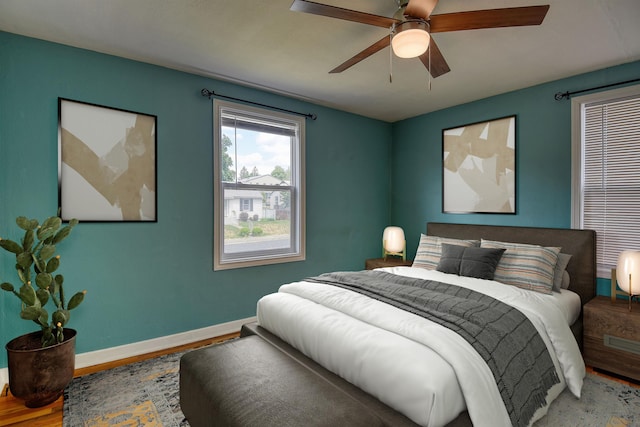 2729 W Broad Ave, Spokane, WA 99205 - bedroom featuring wood finished floors, baseboards, and ceiling fan