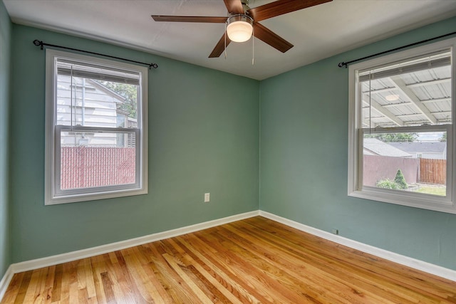 2729 W Broad Ave, Spokane, WA 99205 - spare room with light wood-type flooring, baseboards, and ceiling fan