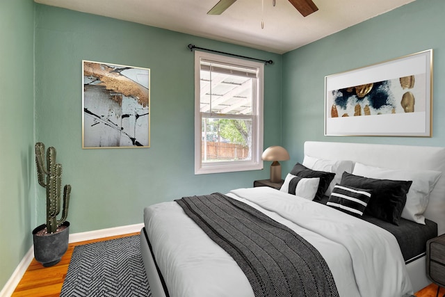 2729 W Broad Ave, Spokane, WA 99205 - bedroom featuring wood finished floors, baseboards, and a ceiling fan