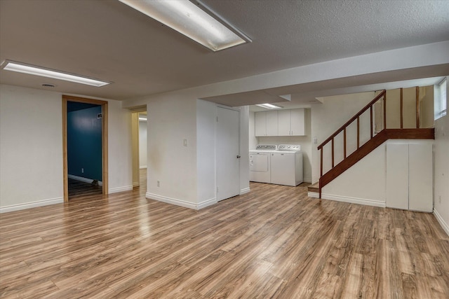 2729 W Broad Ave, Spokane, WA 99205 - finished below grade area with light wood-style floors, washer and dryer, baseboards, and stairs