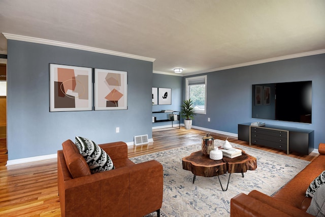 2729 W Broad Ave, Spokane, WA 99205 - living room featuring wood finished floors, ornamental molding, and baseboards