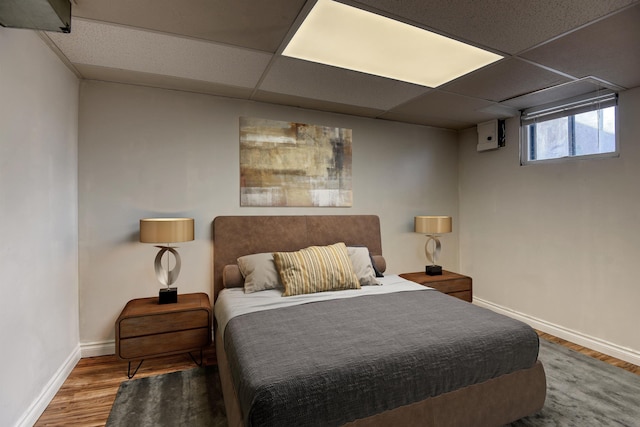2729 W Broad Ave, Spokane, WA 99205 - bedroom featuring wood finished floors, baseboards, and a drop ceiling