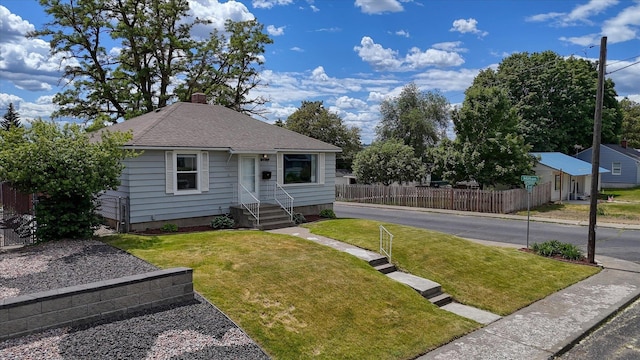 2729 W Broad Ave, Spokane, WA 99205 - bungalow with a chimney and roof with shingles