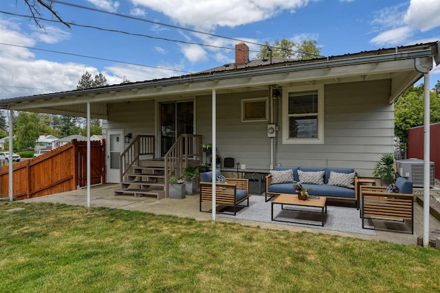 2729 W Broad Ave, Spokane, WA 99205 - rear view of house featuring central air condition unit, an outdoor hangout area, a patio, and a chimney