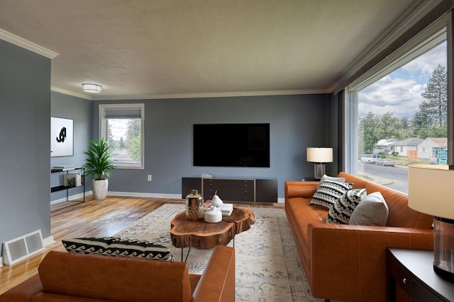 2729 W Broad Ave, Spokane, WA 99205 - living area featuring crown molding, wood finished floors, and baseboards