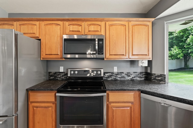 1212 S Drummond Rd, Greenacres, WA 99016 - kitchen with stainless steel appliances and backsplash