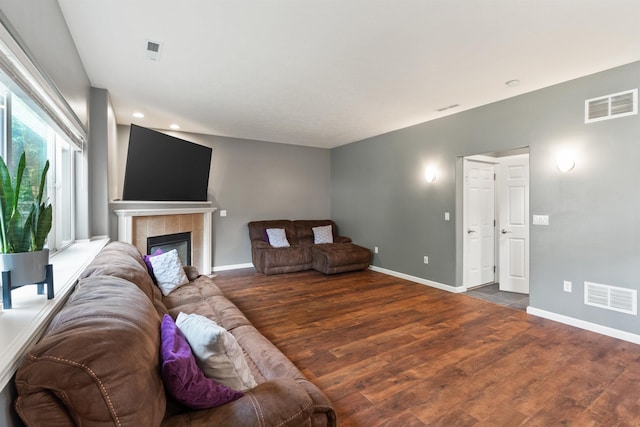 1212 S Drummond Rd, Greenacres, WA 99016 - living area featuring baseboards, wood finished floors, a tile fireplace, and recessed lighting